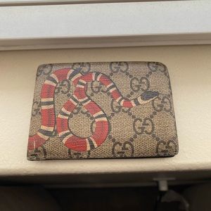 Well loved Gucci Kingsnake wallet